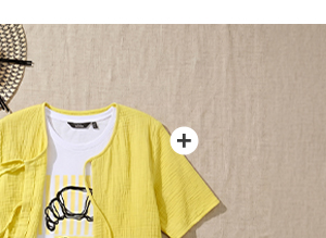 Blusa di mussola con fiocco, scollo a V e mezze maniche