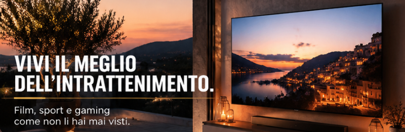 Sunset living room with large wall TV showing a coastal town at dusk and Italian promotional text about entertainment.