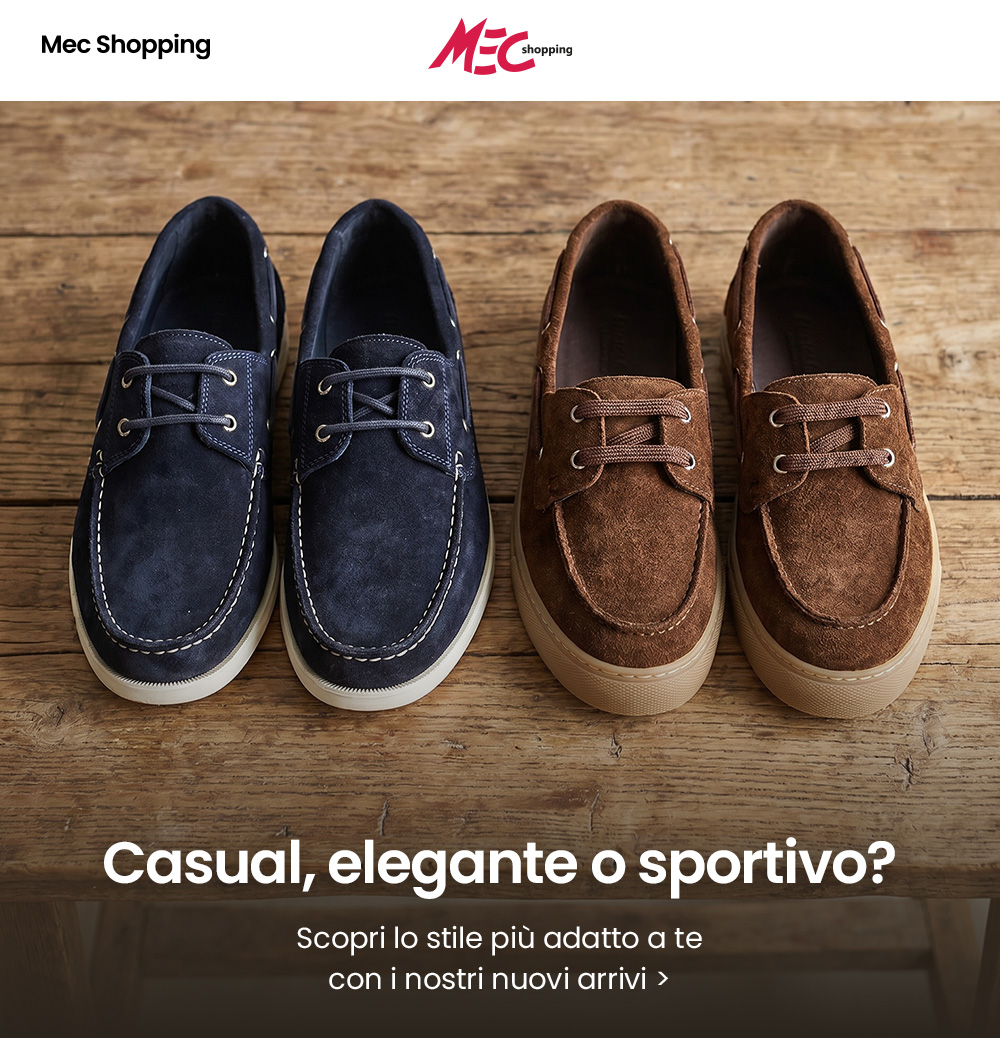 Pair of navy and brown suede casual lace-up shoes on a wooden table, men’s seasonal footwear display
