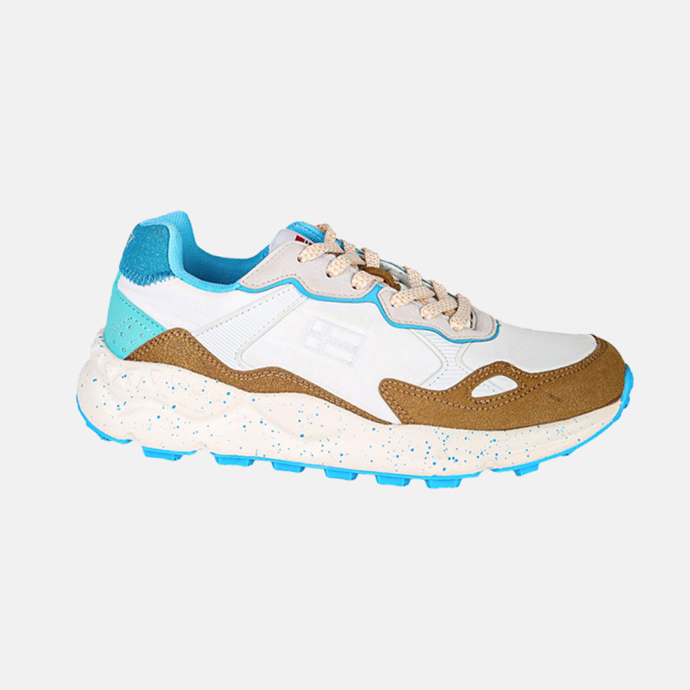 Side view of white trainer with brown suede overlays, turquoise accents and speckled chunky sole