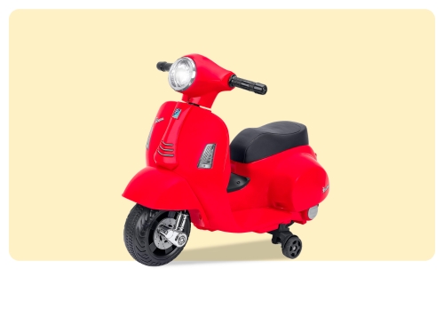 Red vintage-style children's ride-on electric scooter with black seat and small stabiliser wheels on cream background