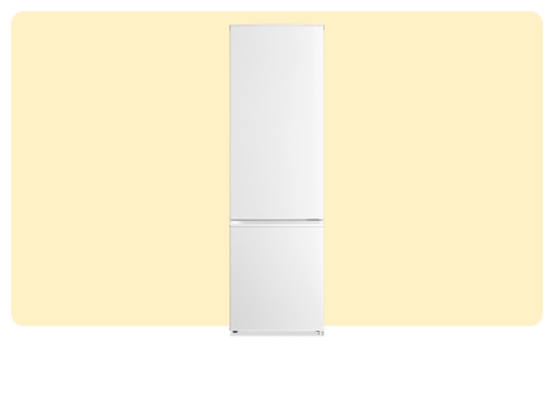 Tall white freestanding fridge with bottom freezer on pale yellow background