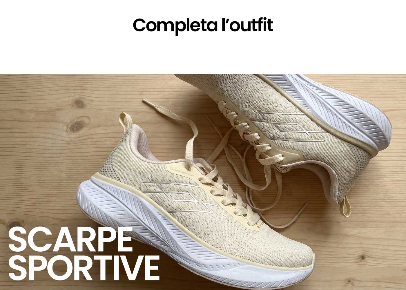 Pair of beige running trainers with white soles and untied laces on a wooden surface, lightweight athletic shoes for everyday wear