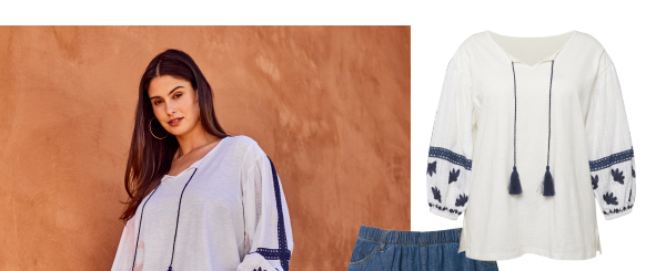 Blusa con ricami, scollo a tunica e maniche lunghe
