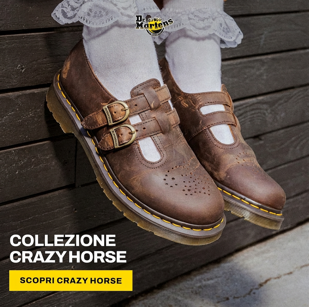 Dr. Martens Mary Jane shoes in brown Crazy Horse leather with buckles and yellow stitching.