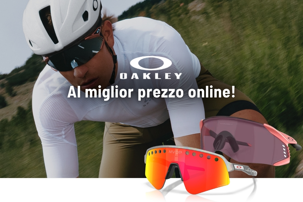 Cyclist wearing white helmet and Oakley kit with two Oakley sport sunglasses (red mirrored and pink lenses) and Oakley logo