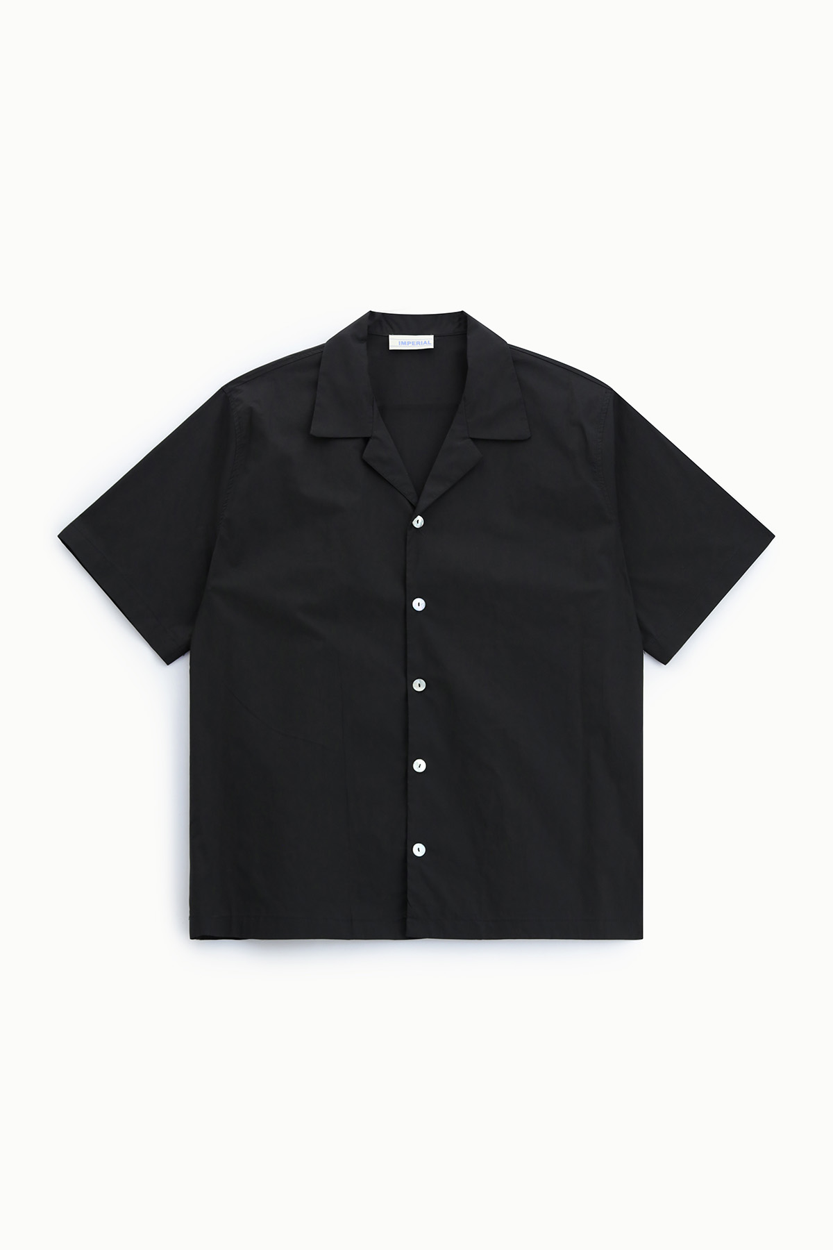 Black short-sleeve button-up shirt with camp collar and white buttons, flat-lay on white background