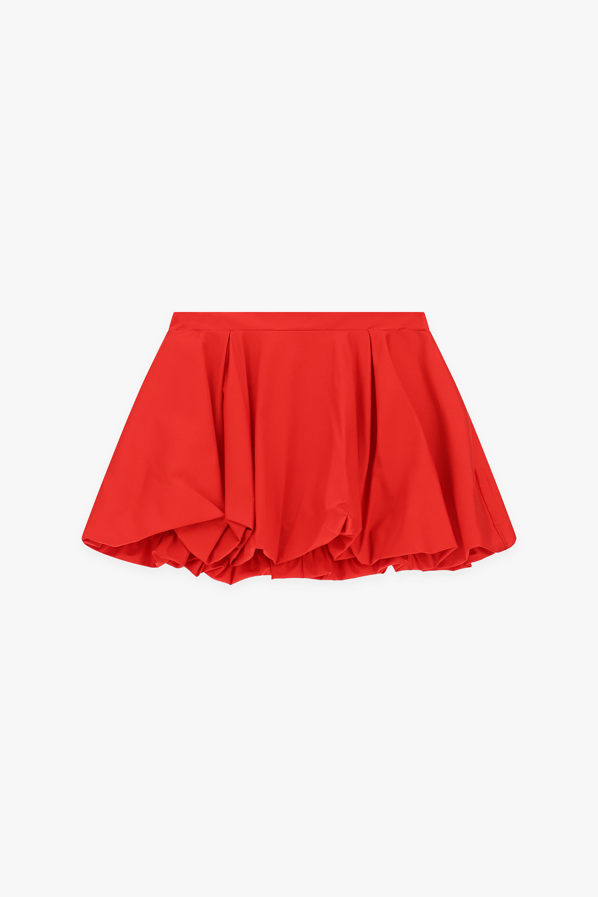 Red bubble-hem mini skirt with pleated panels and fitted waistband on a white background