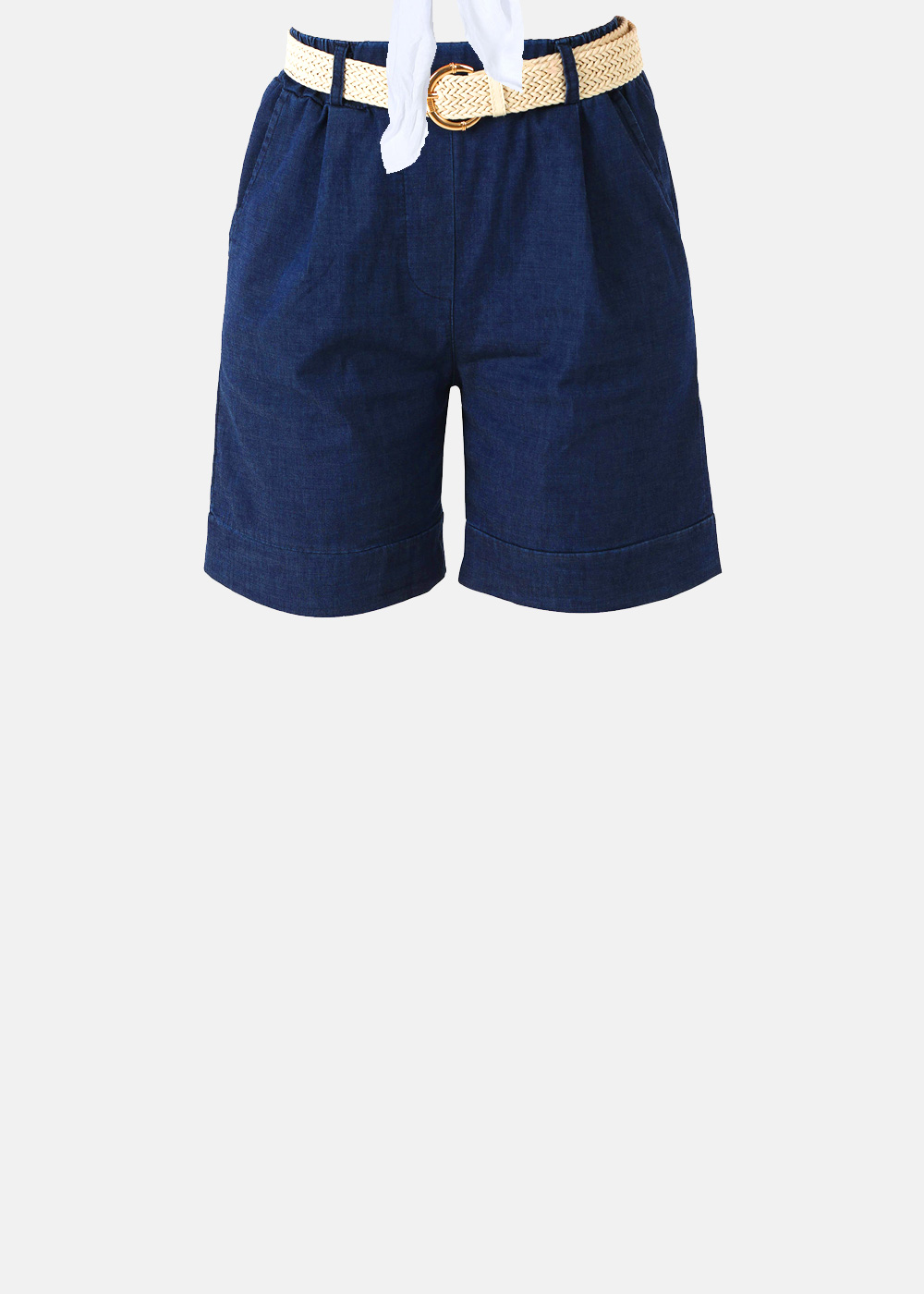 Women's navy denim high-waisted shorts with folded hems, tan woven belt and tied white scarf at the waist
