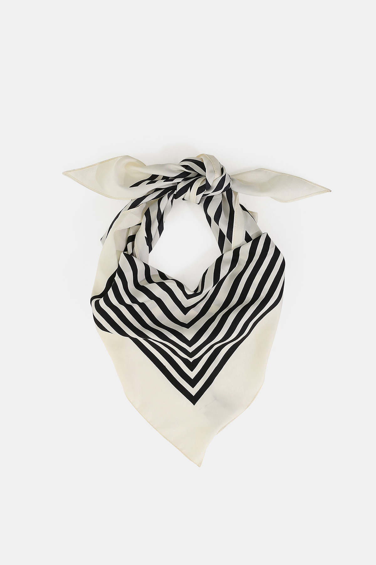 Cream silk neck scarf with black chevron stripes tied in a knot — women's fashion accessory for versatile styling