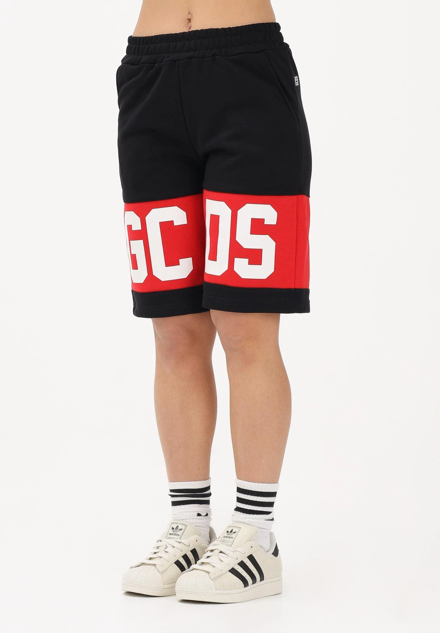 Image of GCDS Shorts sportivo nero per donna, ragazzi e bambini con stampa logo