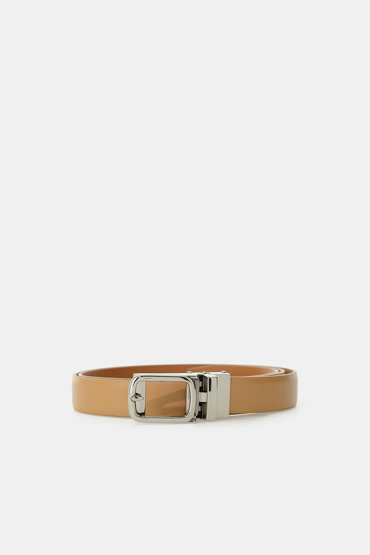 Tan leather belt with polished silver rectangular buckle laid flat on white background, fashion accessory