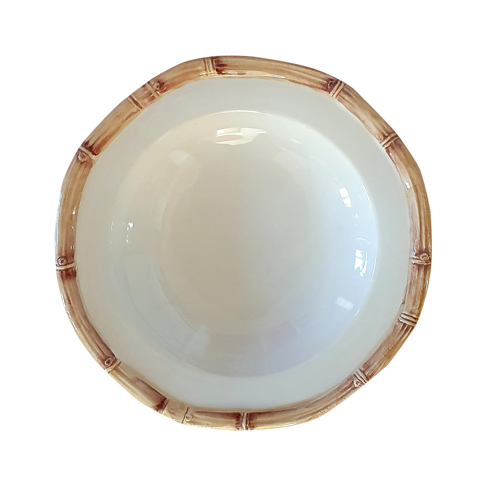 Top-down view of a white ceramic bowl with glossy finish and decorative bamboo-pattern brown rim on a white background