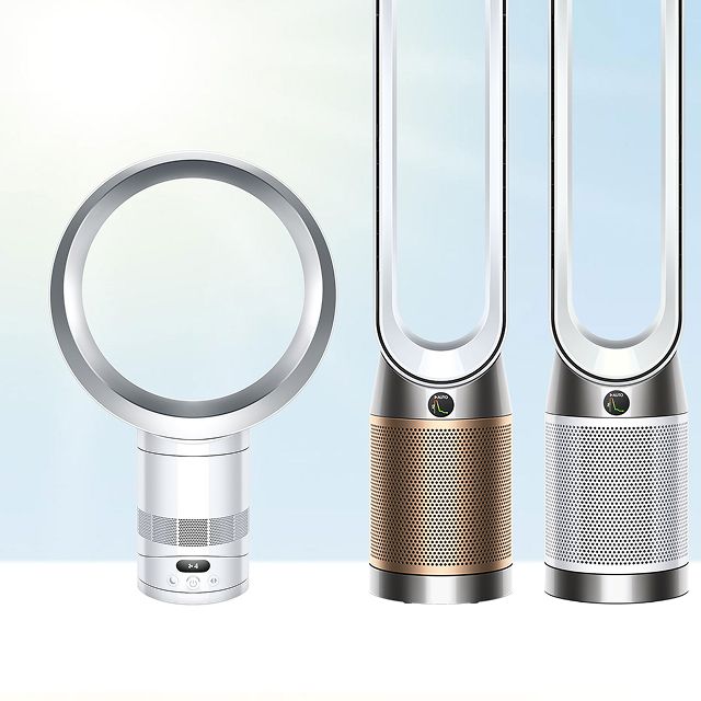 A trio of Dyson air purifiers on display.