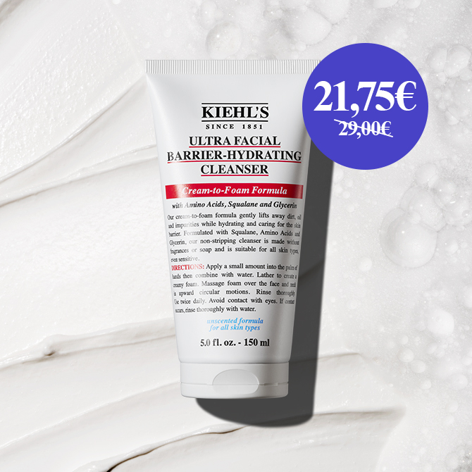 Mani che aprono un vasetto di Creamy Eye Treatment with Avocado Kiehl's