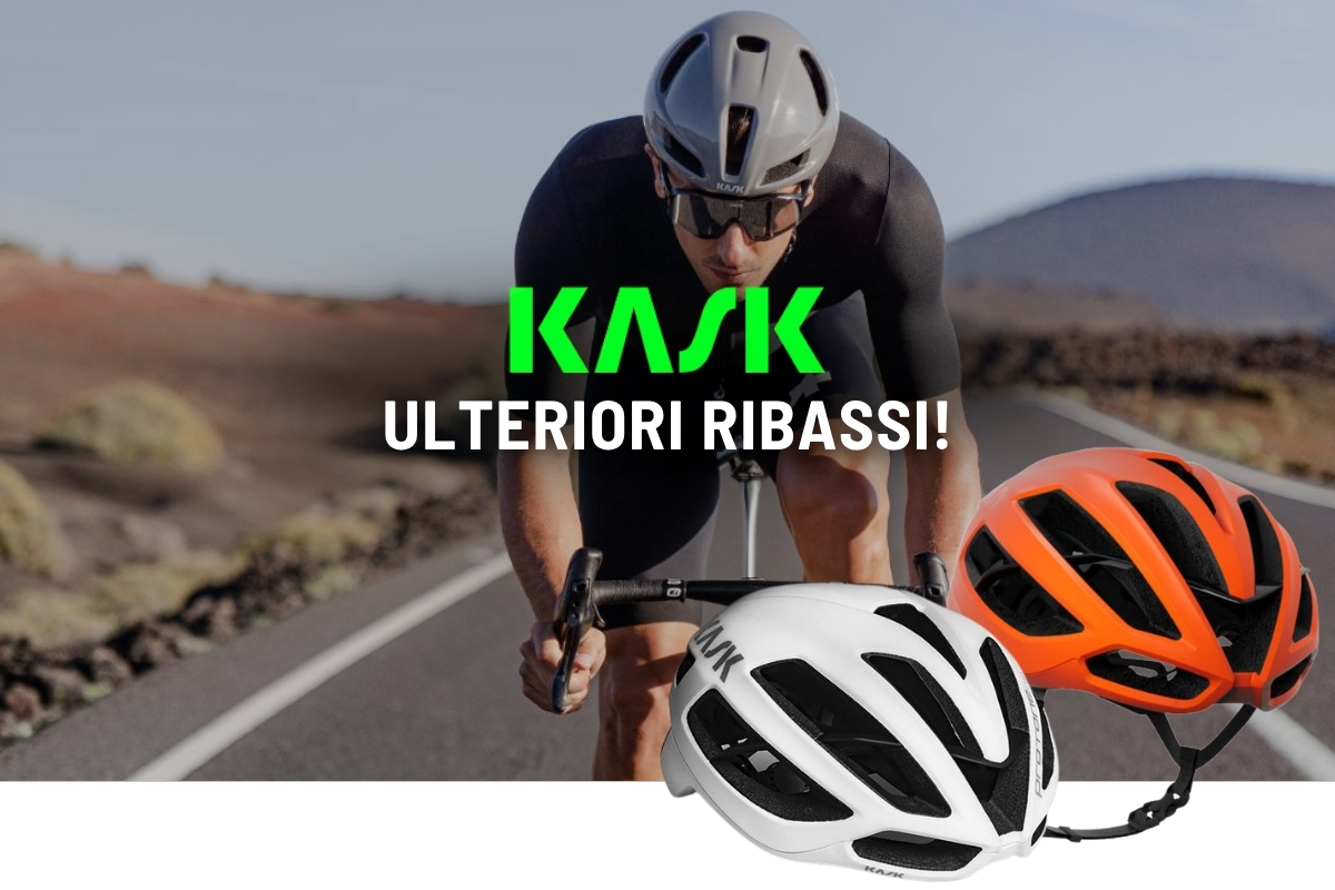 Cyclist in aero position wearing a Kask helmet on an open road with two Kask helmets (white and orange) in the foreground and sale text overlay