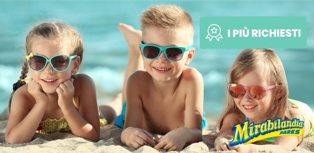 Three smiling children wearing colourful sunglasses lying on a sandy beach with Mirabilandia Parks logo