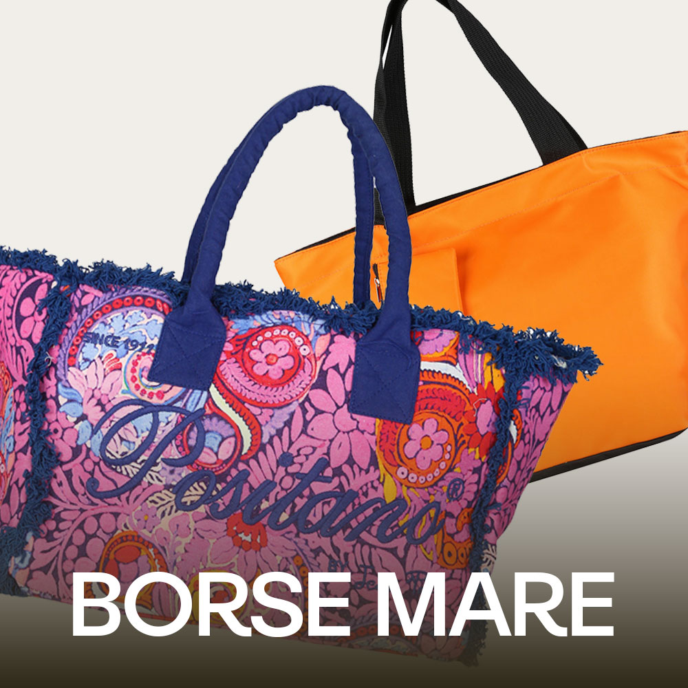 Two large beach tote bags: pink paisley fabric bag with blue handles in front and bright orange nylon tote behind