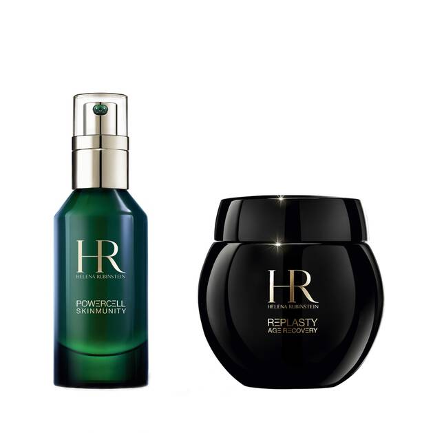 Bottiglia verde Powercell Serum e vaso Age Recovery Night  su uno sfondo bianco 