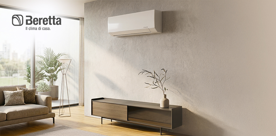 Beretta wall-mounted air conditioner above a TV console in a sunlit modern living room with sofa and plants