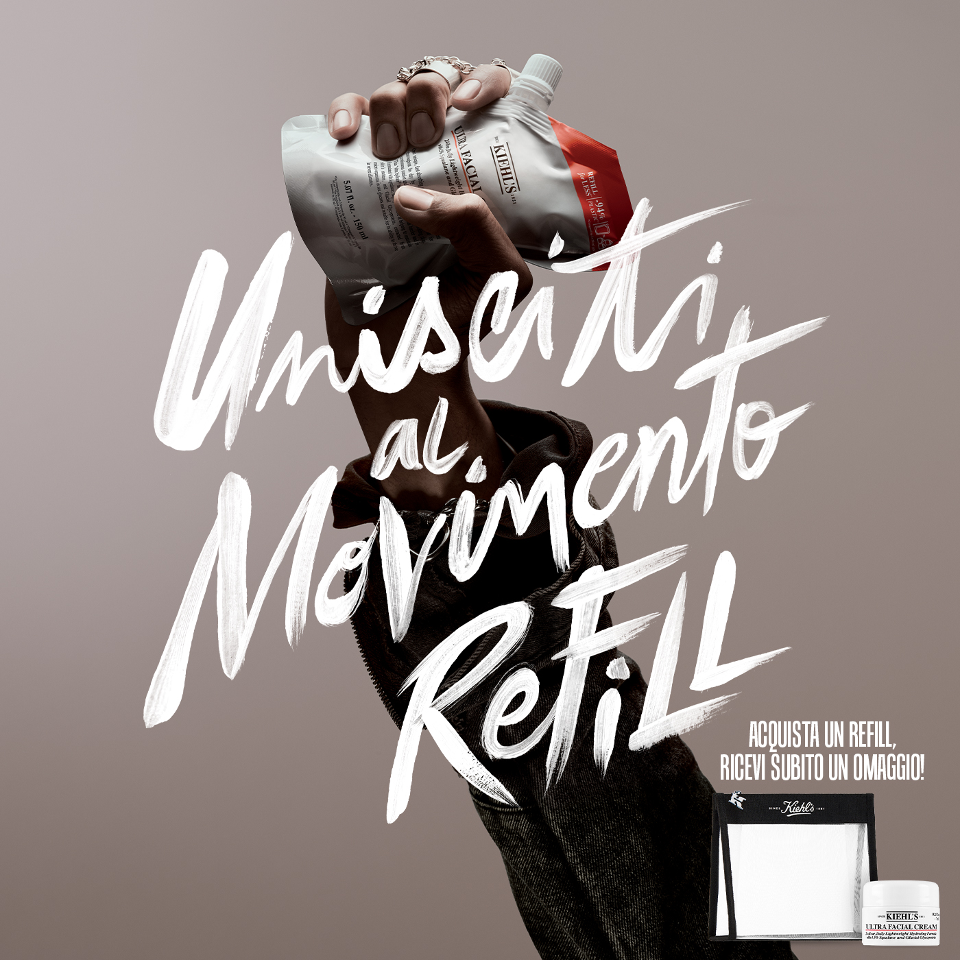 Mano che regge in alto un Refill Kiehl's Ultra Facial Cream. Testo in sovrimpressione: Unisciti al Movimento Refill.