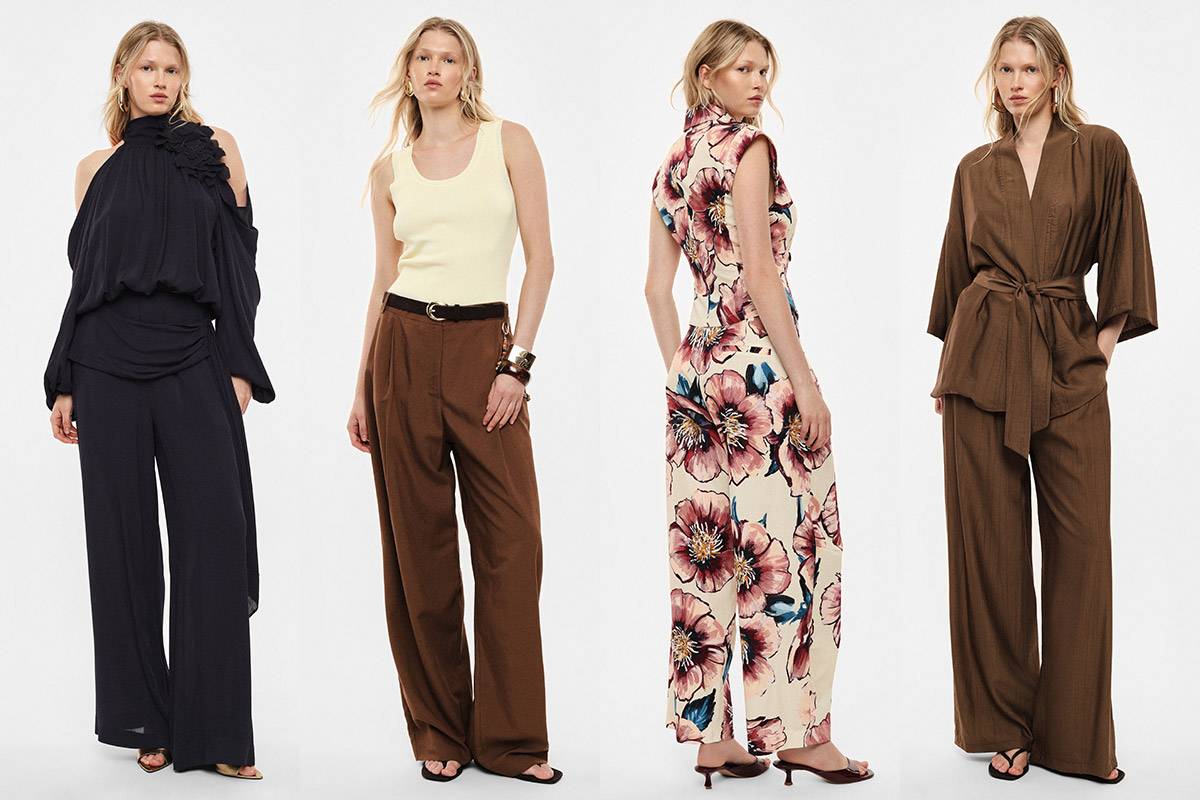 Four models wearing: navy cold-shoulder blouse with wide trousers; cream tank with brown wide-leg trousers; sleeveless floral jumpsuit; brown kimono wrap top with matching trousers