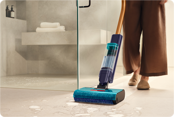 Dyson Clean+Wash Hygiene wet floor cleaner used to clean a tiled floor.