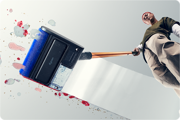 Dyson PencilWash cleaner used to clean spills on a hard floor.