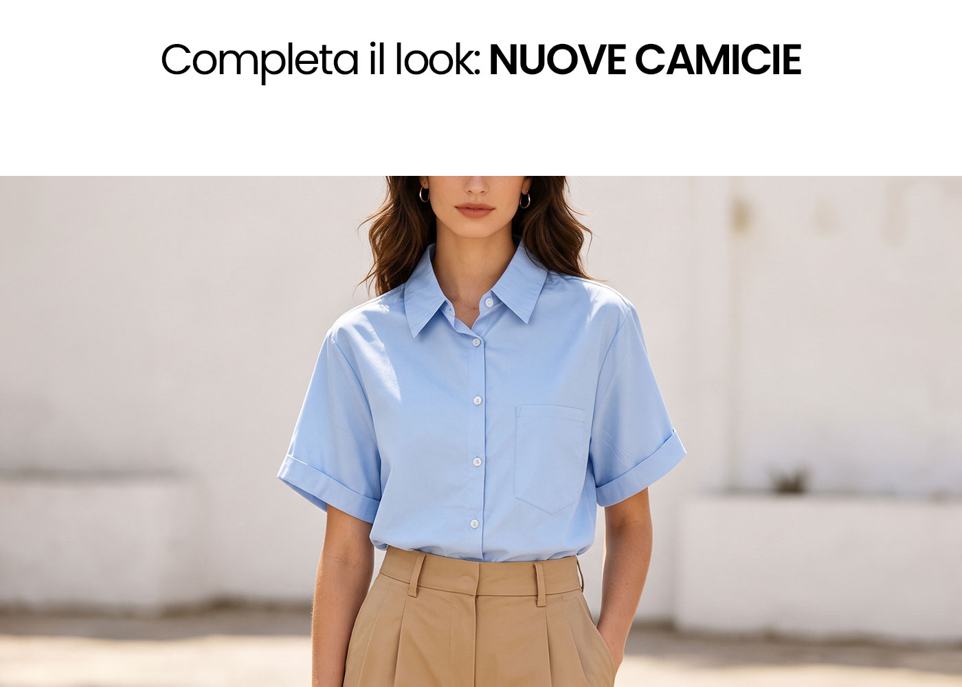 Model wearing pastel blue short-sleeve button-up shirt tucked into beige high-waist trousers for a smart-casual look