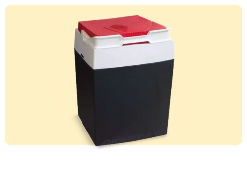 Portable electric cooler box with black body, white top and red lid on a pale cream background