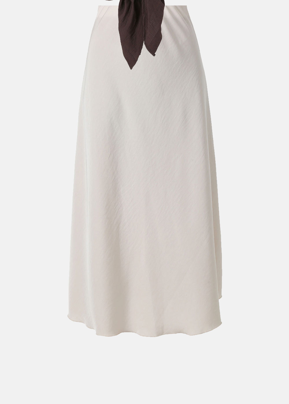 Cream maxi A-line skirt with high waist and subtle sheen, styled with a tied dark-brown scarf at the waist