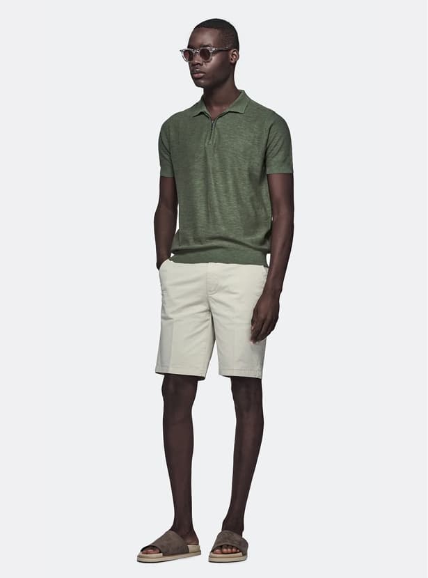 Polo in cotone e lino con zip
