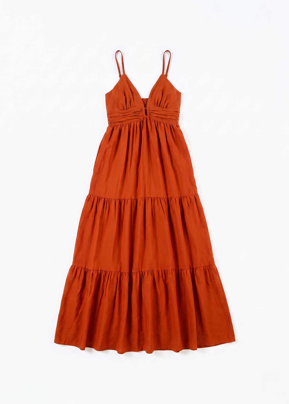 Rust-coloured tiered maxi dress with spaghetti straps, V-neck and gathered waist, laid flat on white background