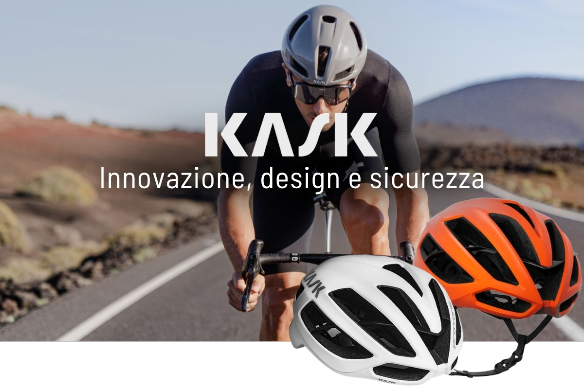 Cyclist riding on an open road with KASK logo overlay and two road cycling helmets (white and orange) in the foreground