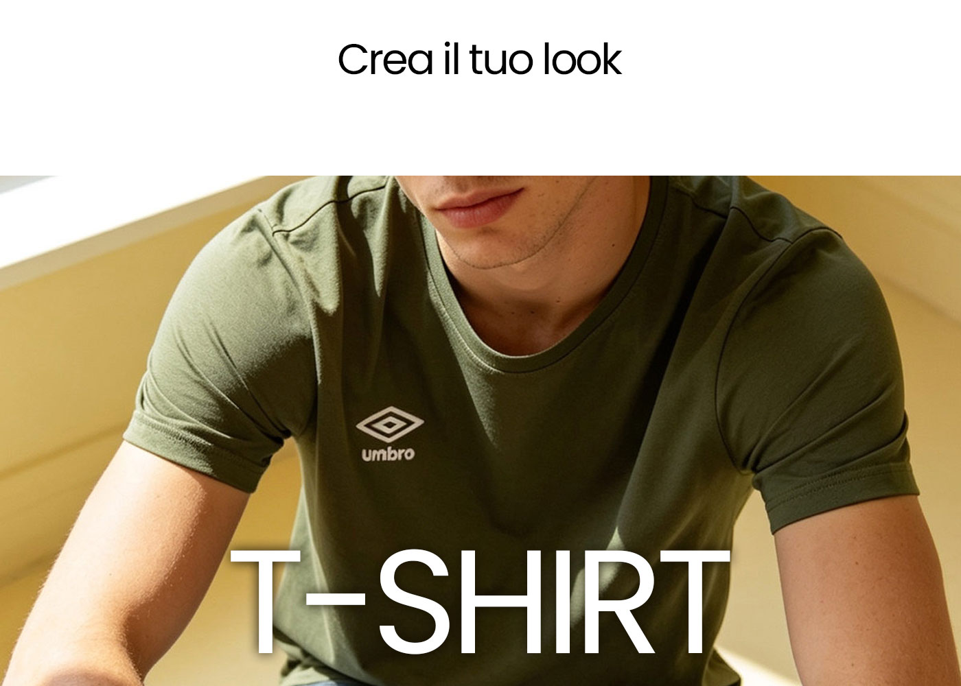 Close-up of young man wearing olive-green Umbro t-shirt with visible logo, casual seated pose and overlay text 'T-SHIRT'