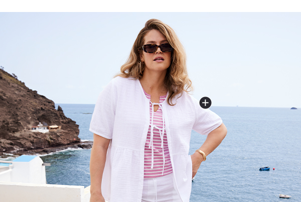 Blusa di mussola con fiocco, scollo a V e mezze maniche