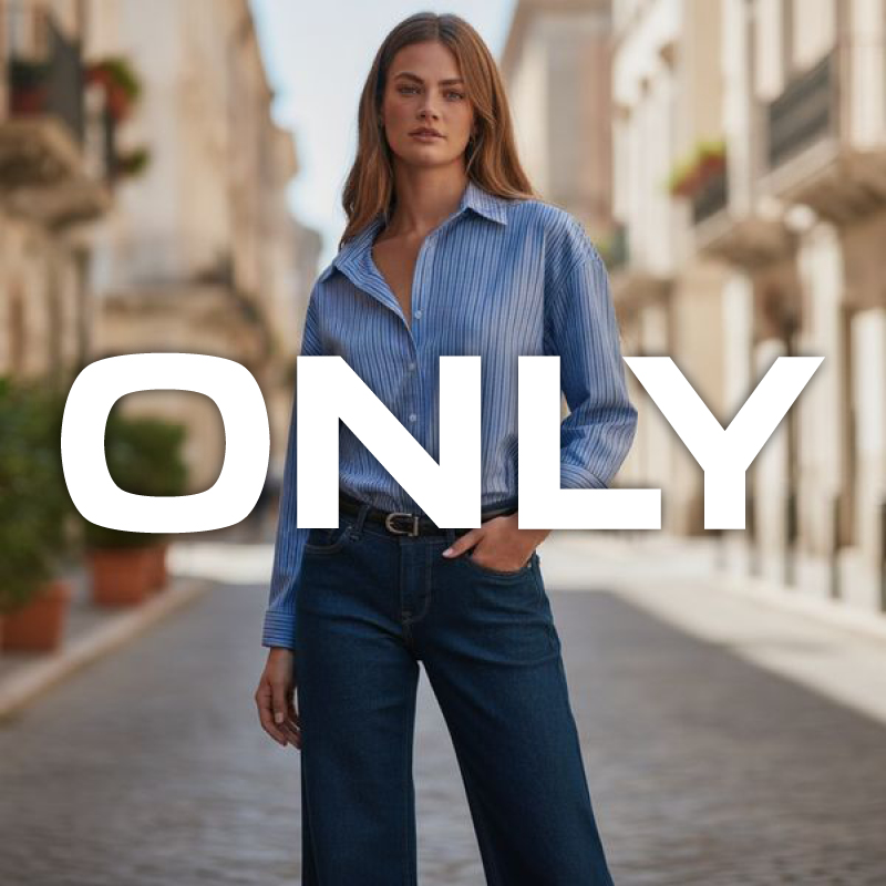 Model wearing a blue striped shirt and dark jeans on a sunlit cobblestone street with 'ONLY' logo overlay