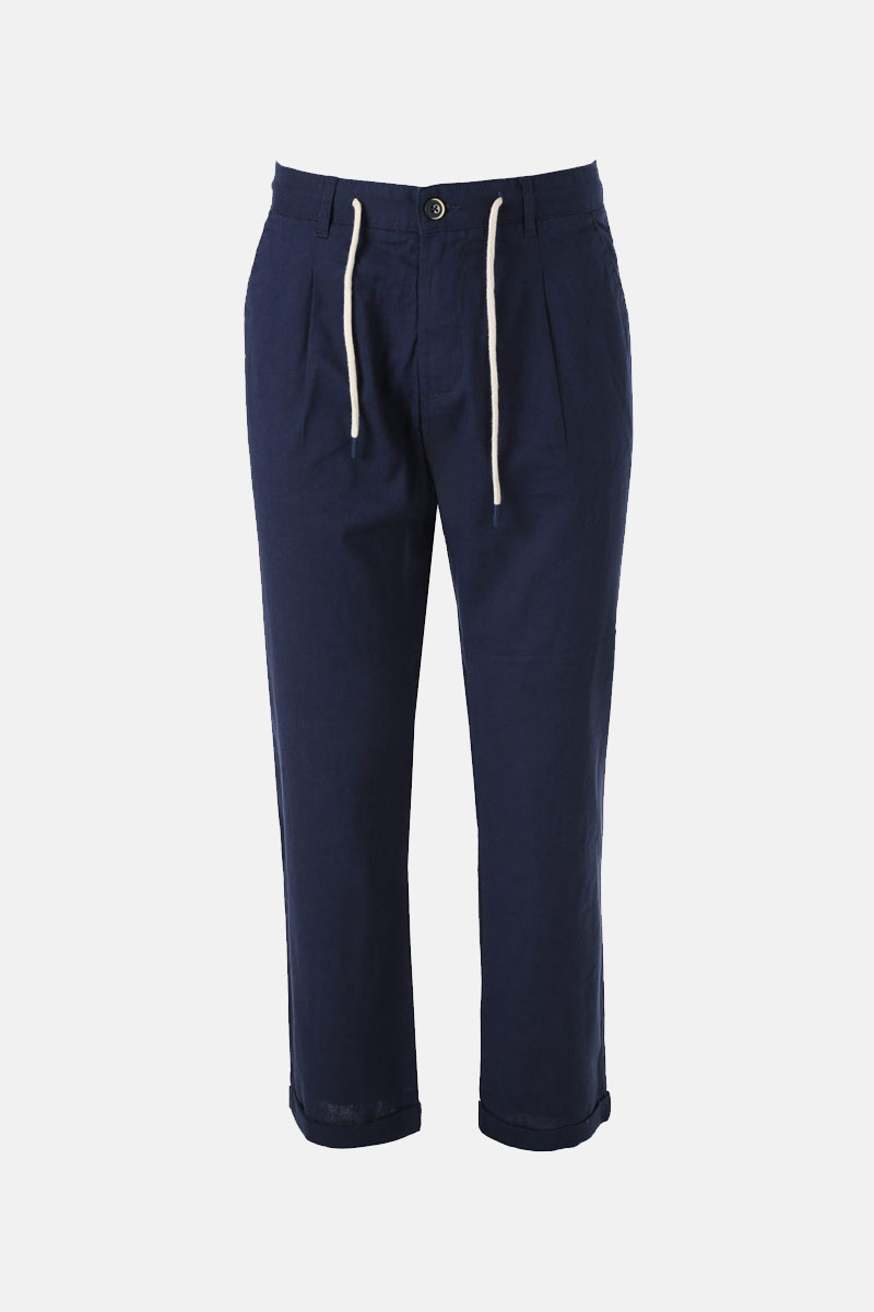 Navy relaxed-fit drawstring trousers with button waist and rolled cuffs, front view on white background
