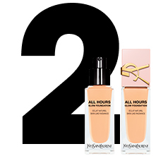 Un grande numero "2" nero accanto a due flaconi di fondotinta YSL All Hours Glow, uno aperto con erogatore a pompa e uno chiuso con tappo rosa.