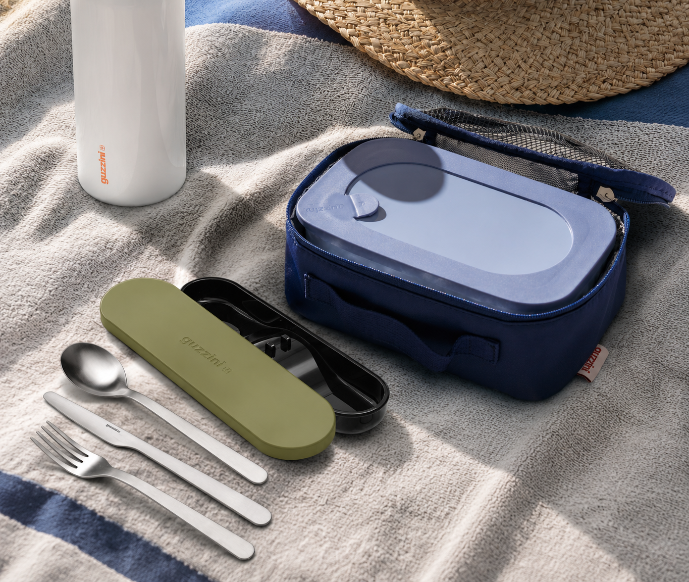 https://guzzini.com/it/products/borsa-termica-bauletto-handy-greta-on-the-go?variant=53035039785288