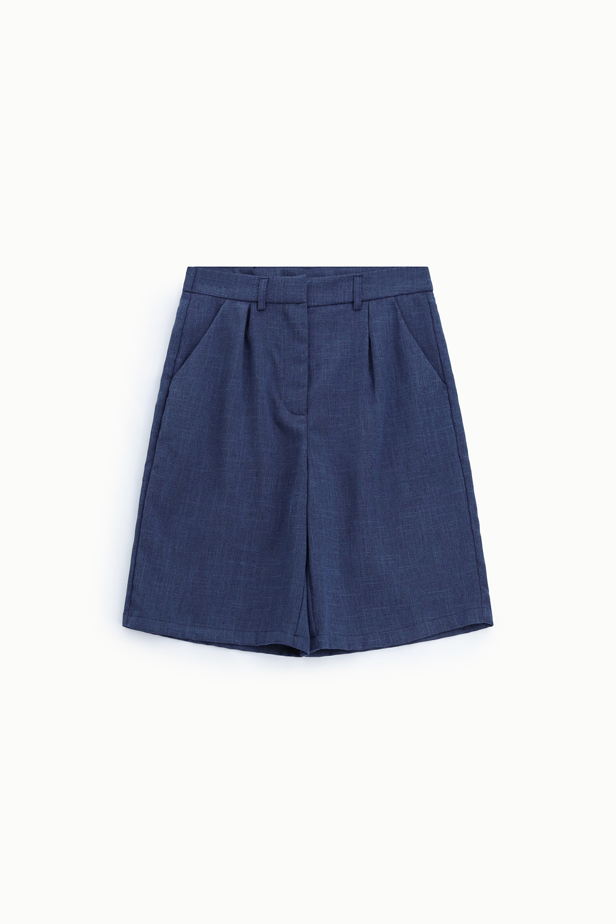 Flat-lay of women's high-waist navy blue tailored shorts with belt loops, pleats and side pockets on white background