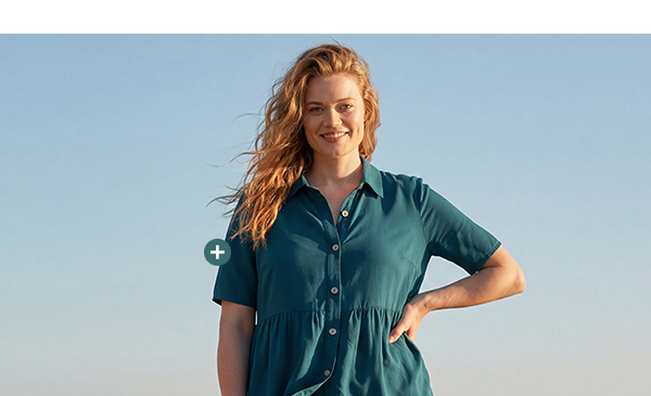 Maglia dal taglio svasato con baschina, collo da camicia e mezze maniche