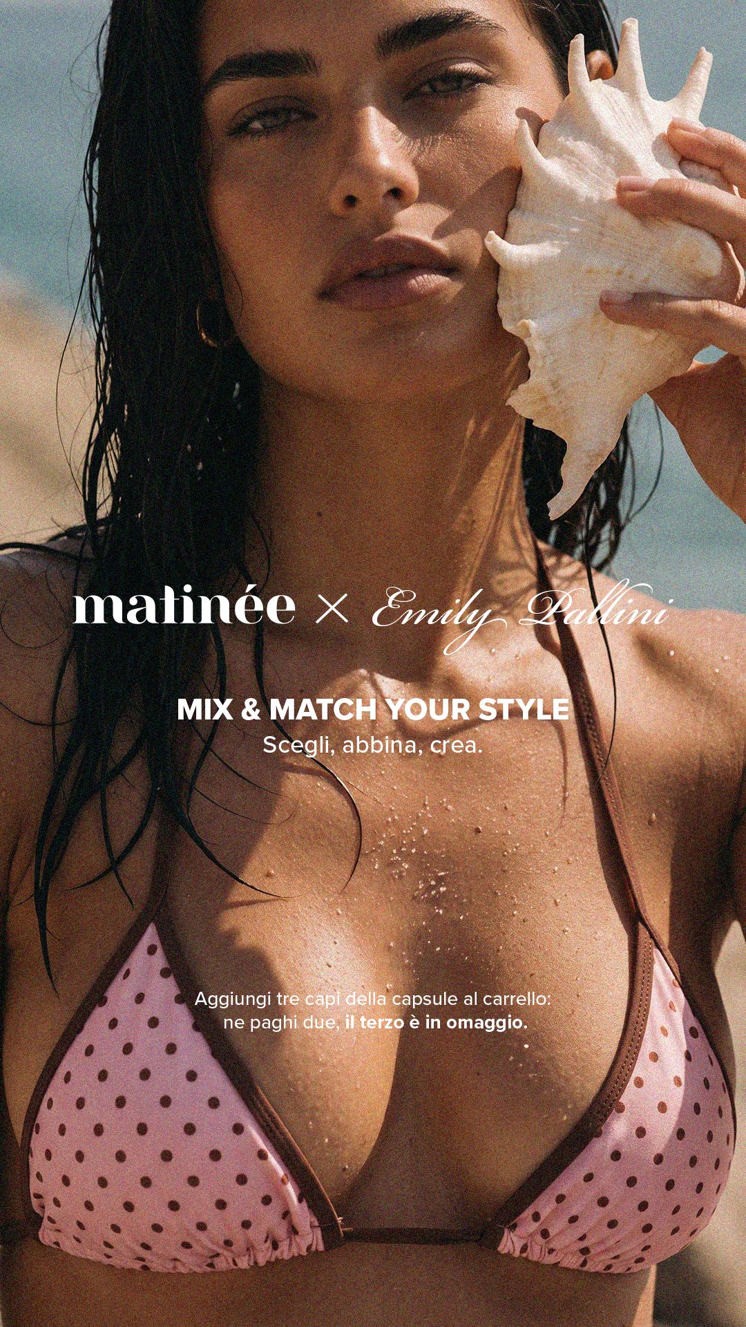Woman on sunlit beach holding a conch shell to her ear, wearing a pink polka-dot bikini top — summer fashion ad