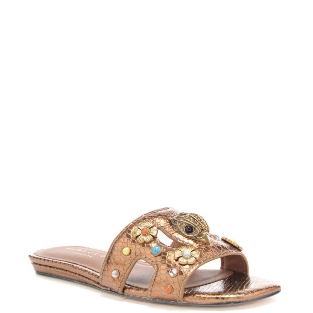 https://kimaccessori.it/scarpe-basse-da-donna-in-pelle-laminata-pitonata-con-decorazioni-frontali-bronzo-kurt-geiger-5612068119-bronze