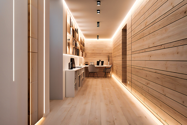 Modern minimalist wooden office corridor with built-in shelving, two desks and warm LED strip lighting