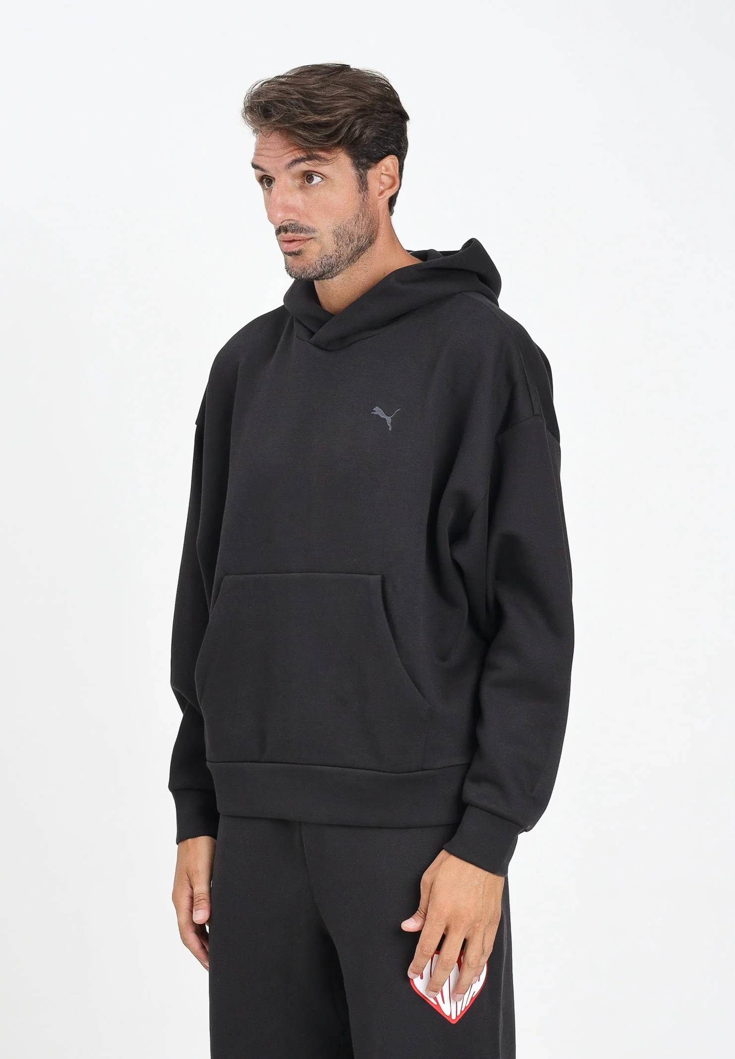 Image of PUMA Felpa con cappuccio WARDROBE ESS nera da uomo