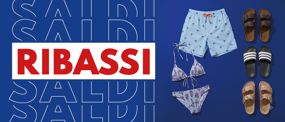 Flat-lay on blue background: men's swim shorts, women's bikini and three pairs of sandals beside bold red 'RIBASSI' sale sign