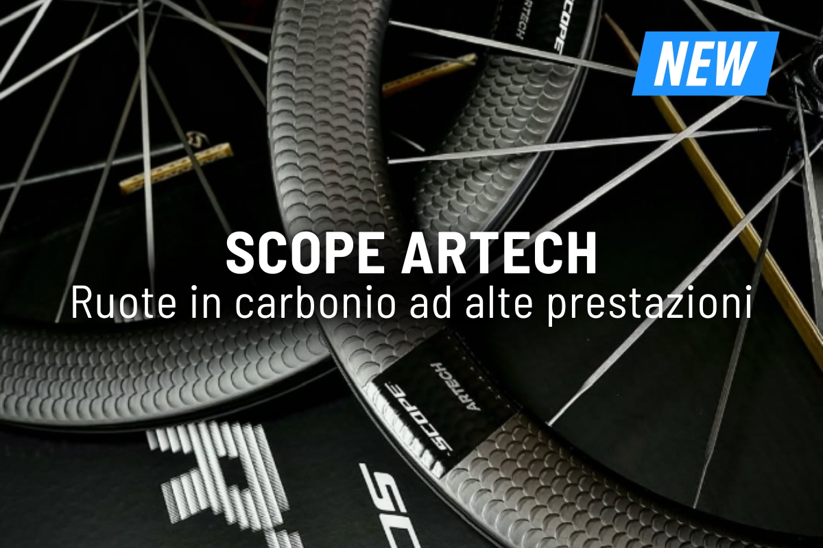 Close-up of new Scope Artech carbon bicycle wheels with textured rims and spokes, high-performance cycling wheelset