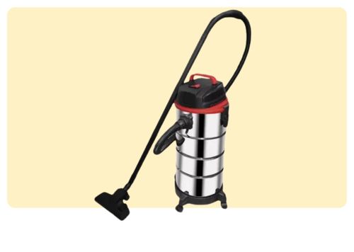 Stainless-steel wet and dry shop vacuum cleaner with long hose and floor nozzle on pale beige background