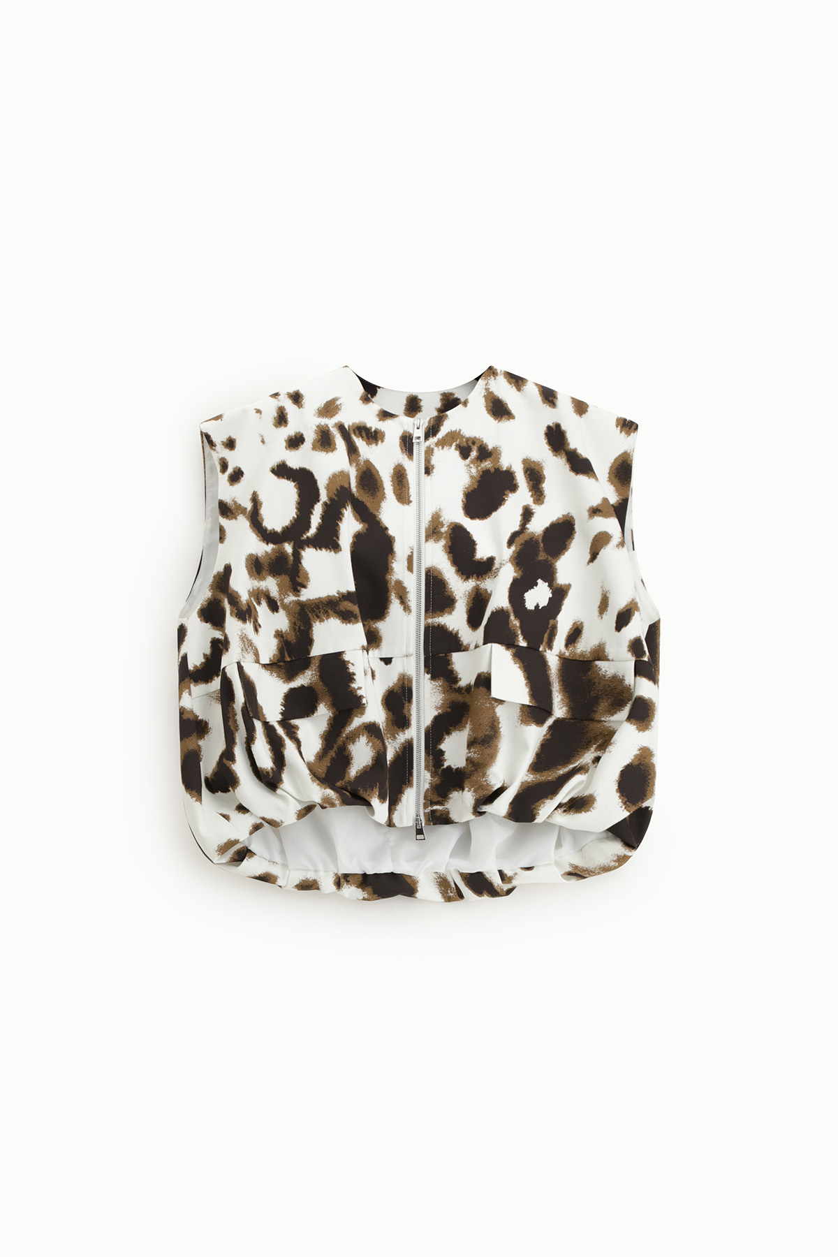 Cropped sleeveless zip-up vest in brown and black leopard print with front patch pockets on white background